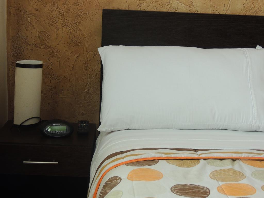 Titan Hotel & Spa Богота Номер фото